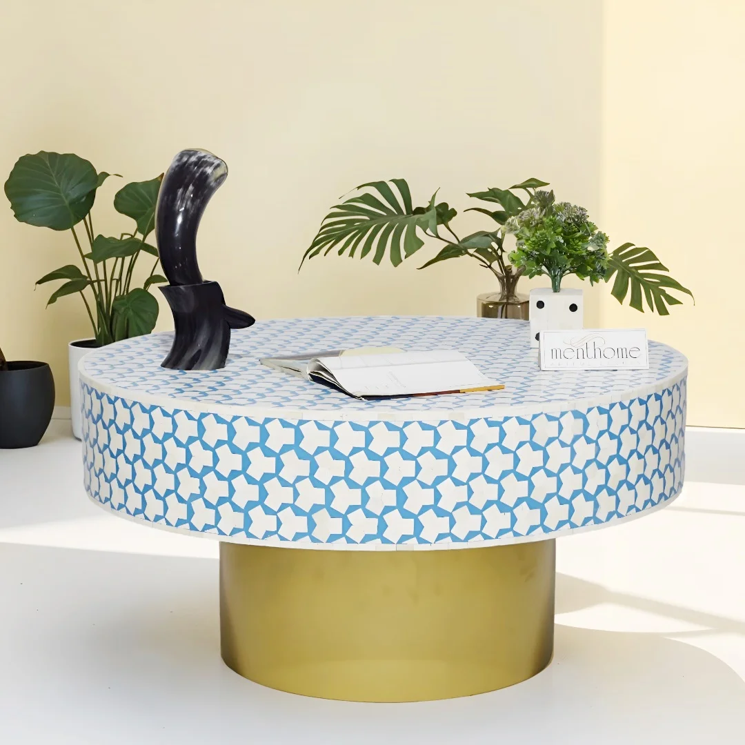 Round Coffee Table in Sky Blue, featuring a sleek Brass Base