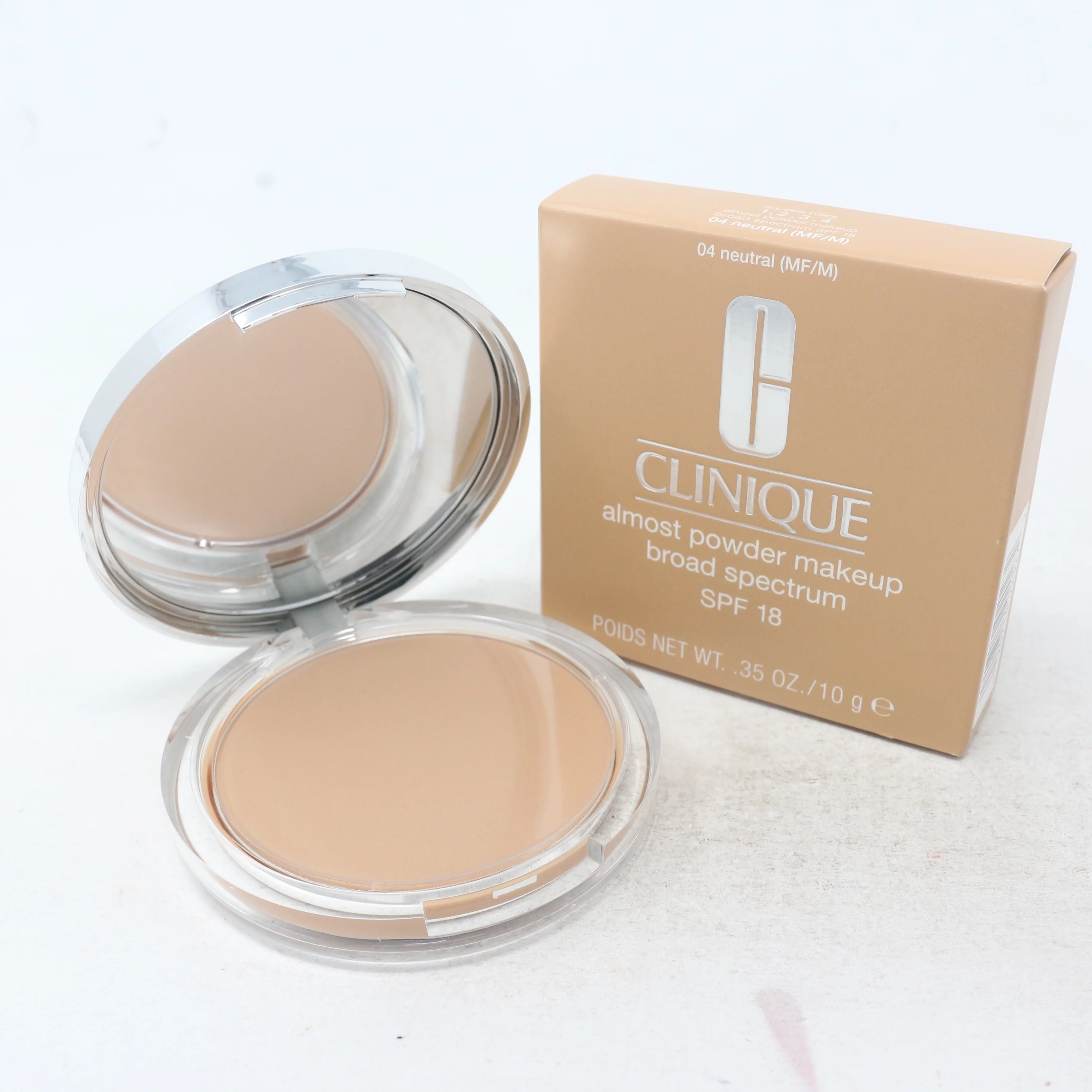 CLINIQUE ALMOST POWDER FOUNDATION 0.35 OZ 03 LIGHT CLINIQUE/ALMOST POWDER SPF 15 FOUNDATION POWDER 0.35 OZ (10.5 ML) SPF 18
