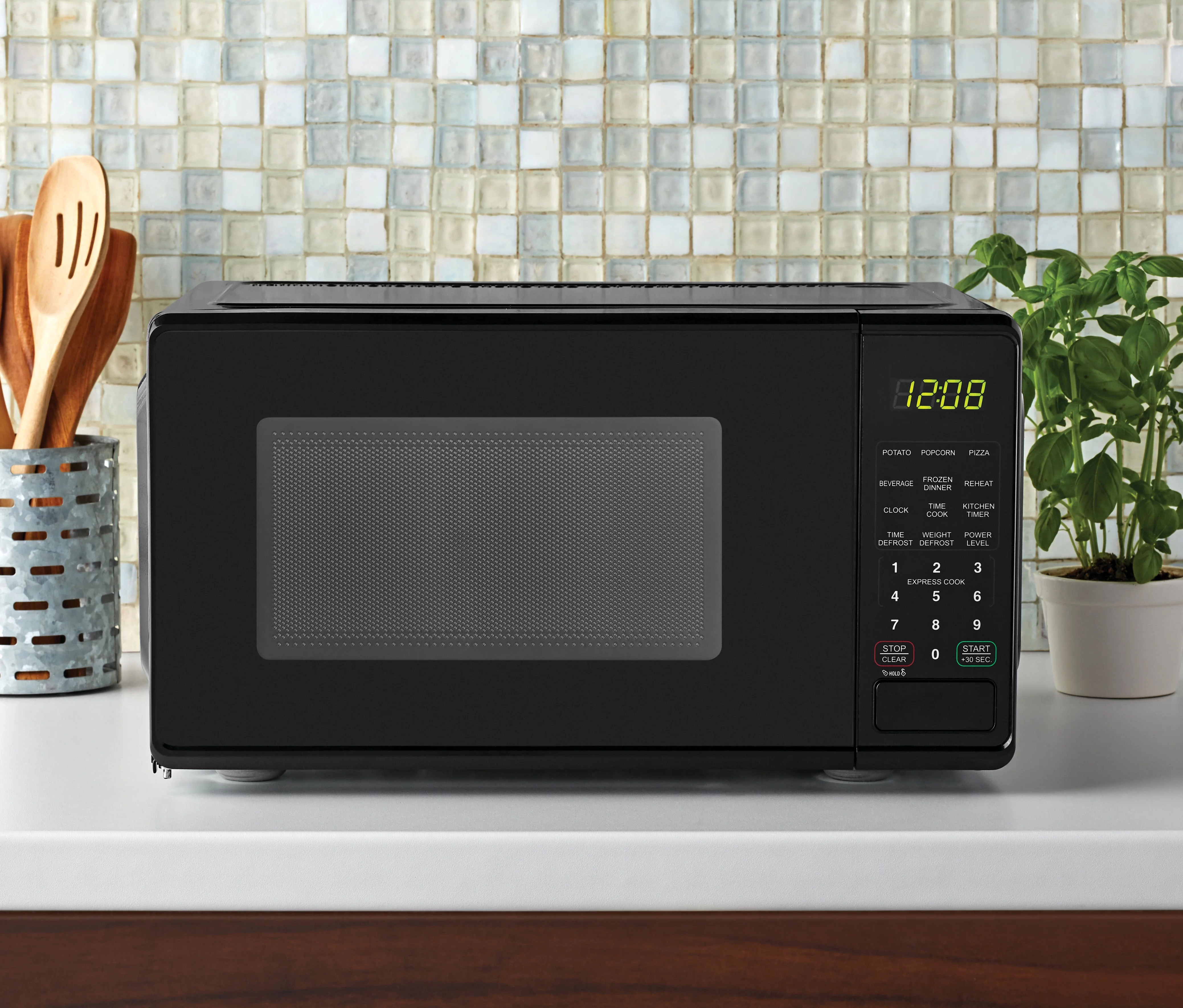 Mainstays 0.7 Cu ft Countertop Microwave Oven, 700 Watts, Black, New