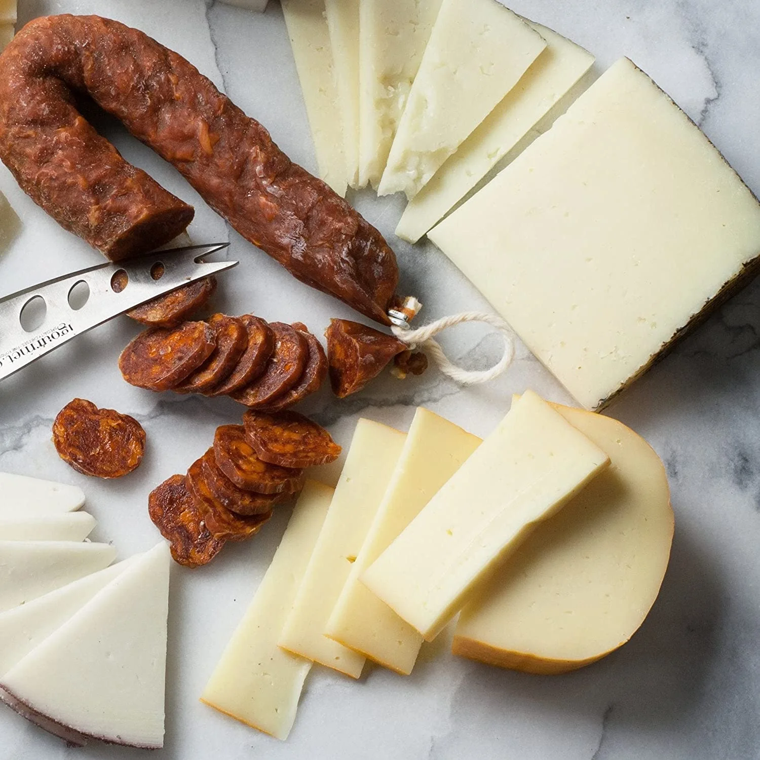 A Little Bit of Spain in Gift Box - A Full Collection of The Flavors and Culinary Stables of Spain - Fine Cheeses, Meats, Spanish Delicacies, and sweets.