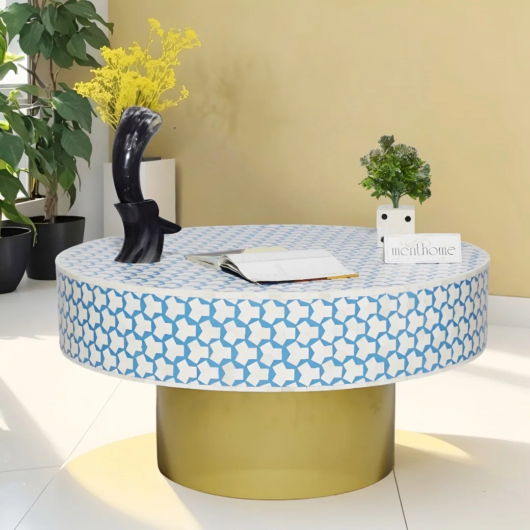 Round Coffee Table in Sky Blue, featuring a sleek Brass Base