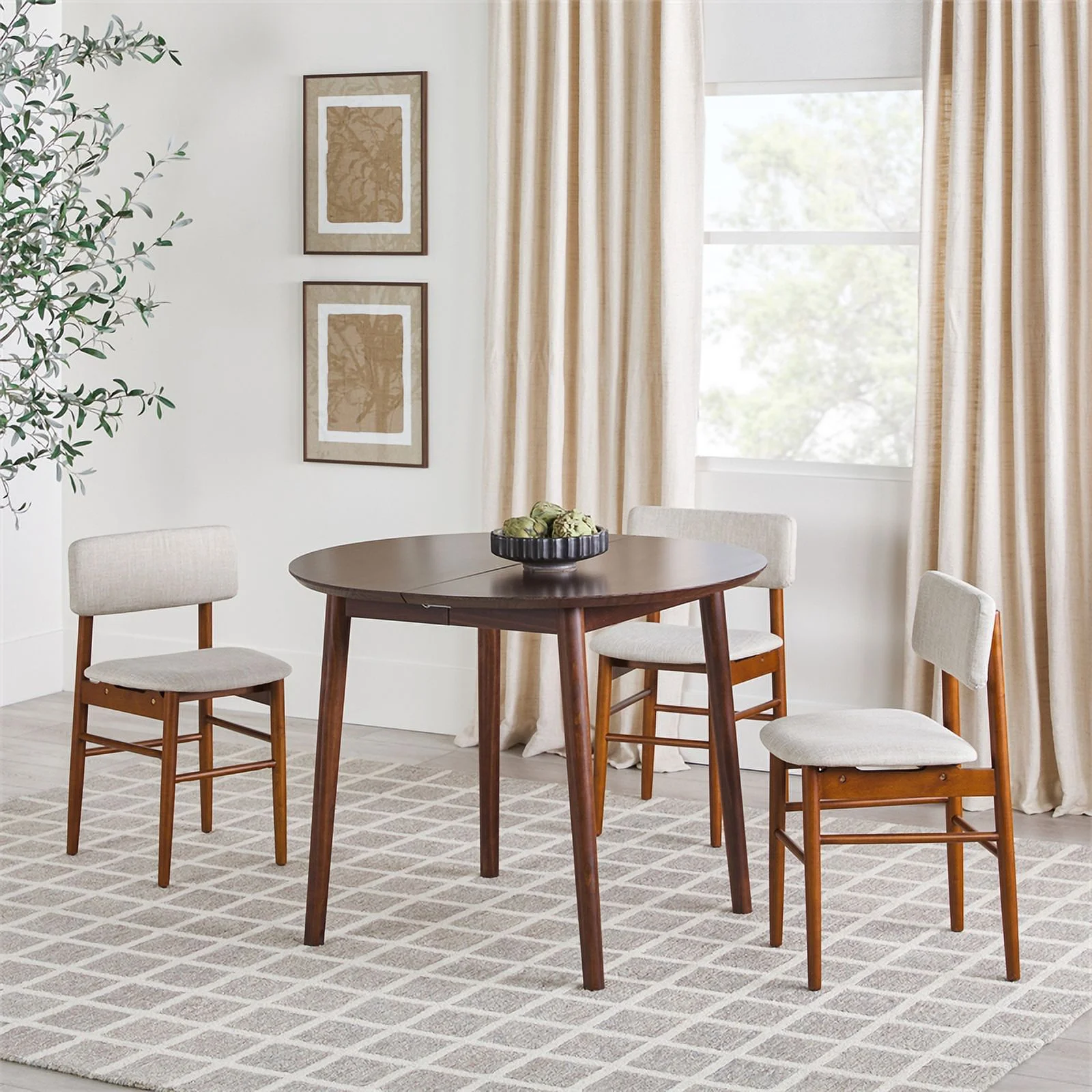 Pemberly Row Oval Solid Wood Dining Table with Removable Leaf in Walnut