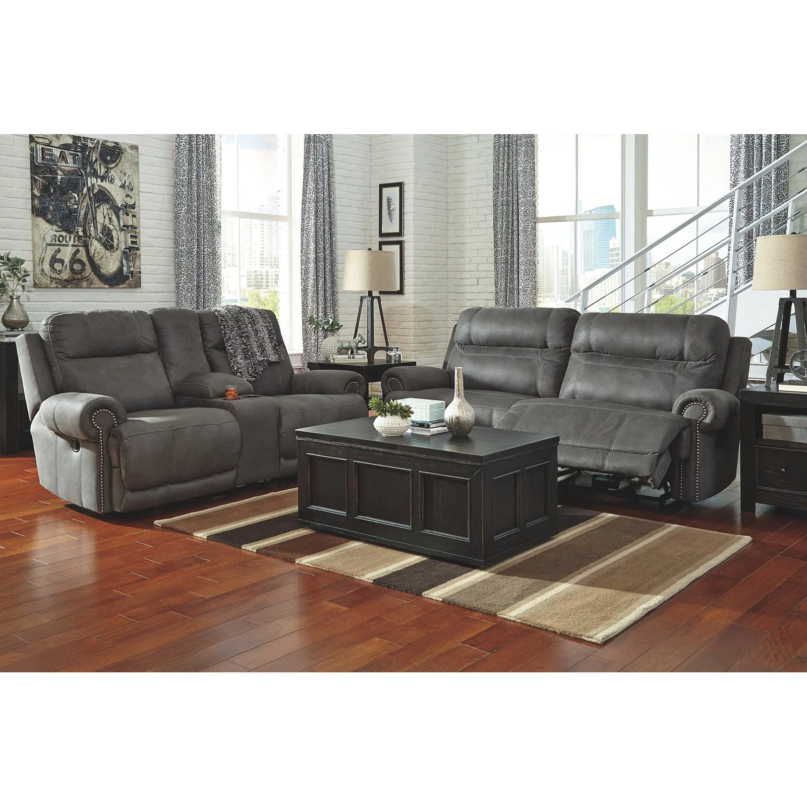 Ashley Furniture Austere Faux Leather Reclining Sofa in Gray