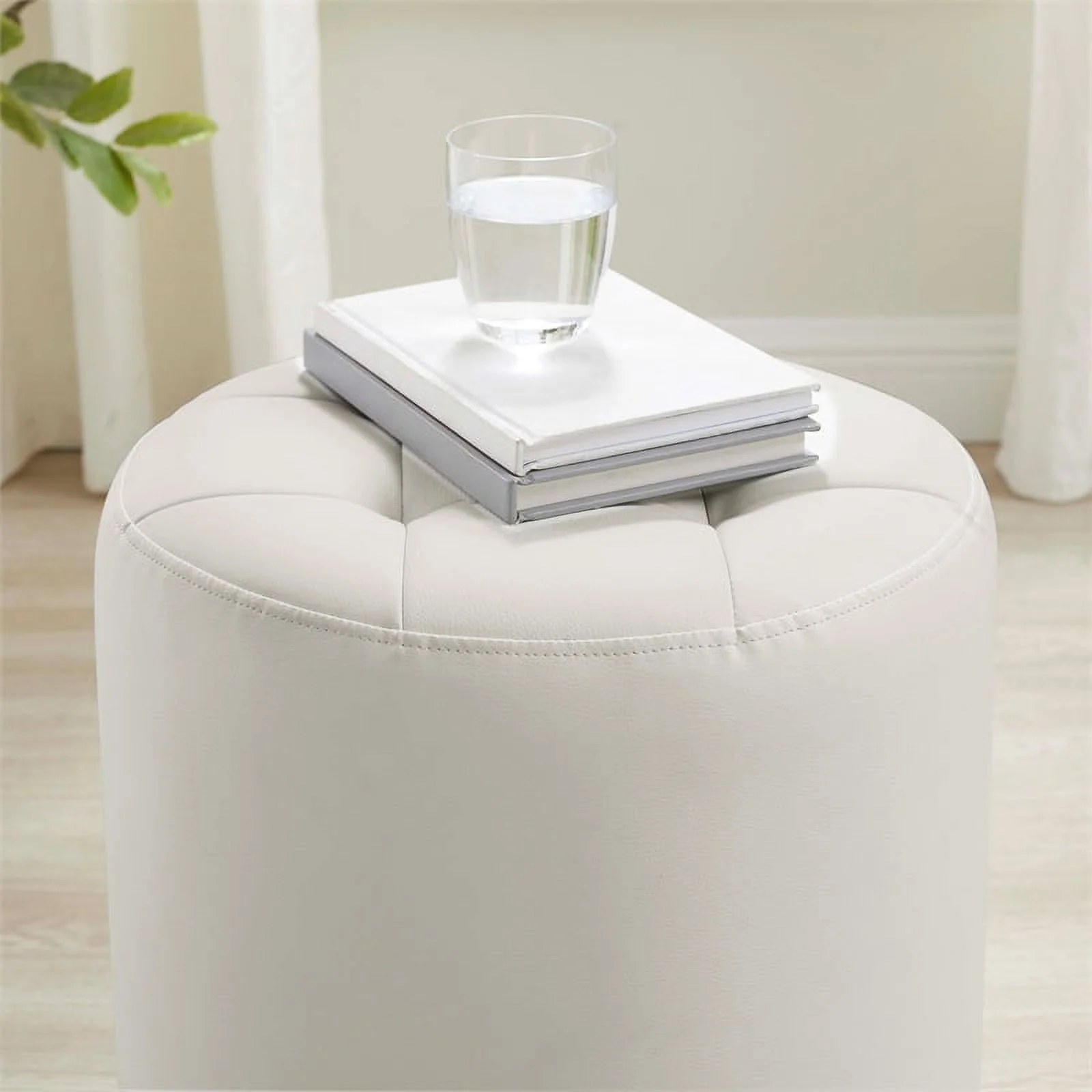 Bowery Hill Modern Round Faux Leather Swivel Ottoman in White