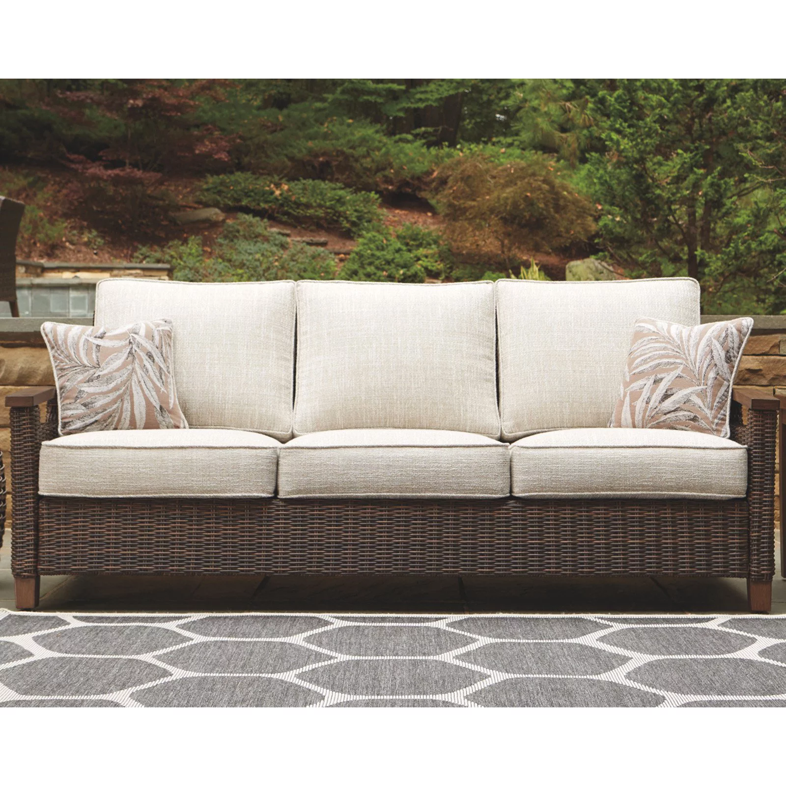Ashley Furniture Paradise Trail Patio Sofa in Medium Brown