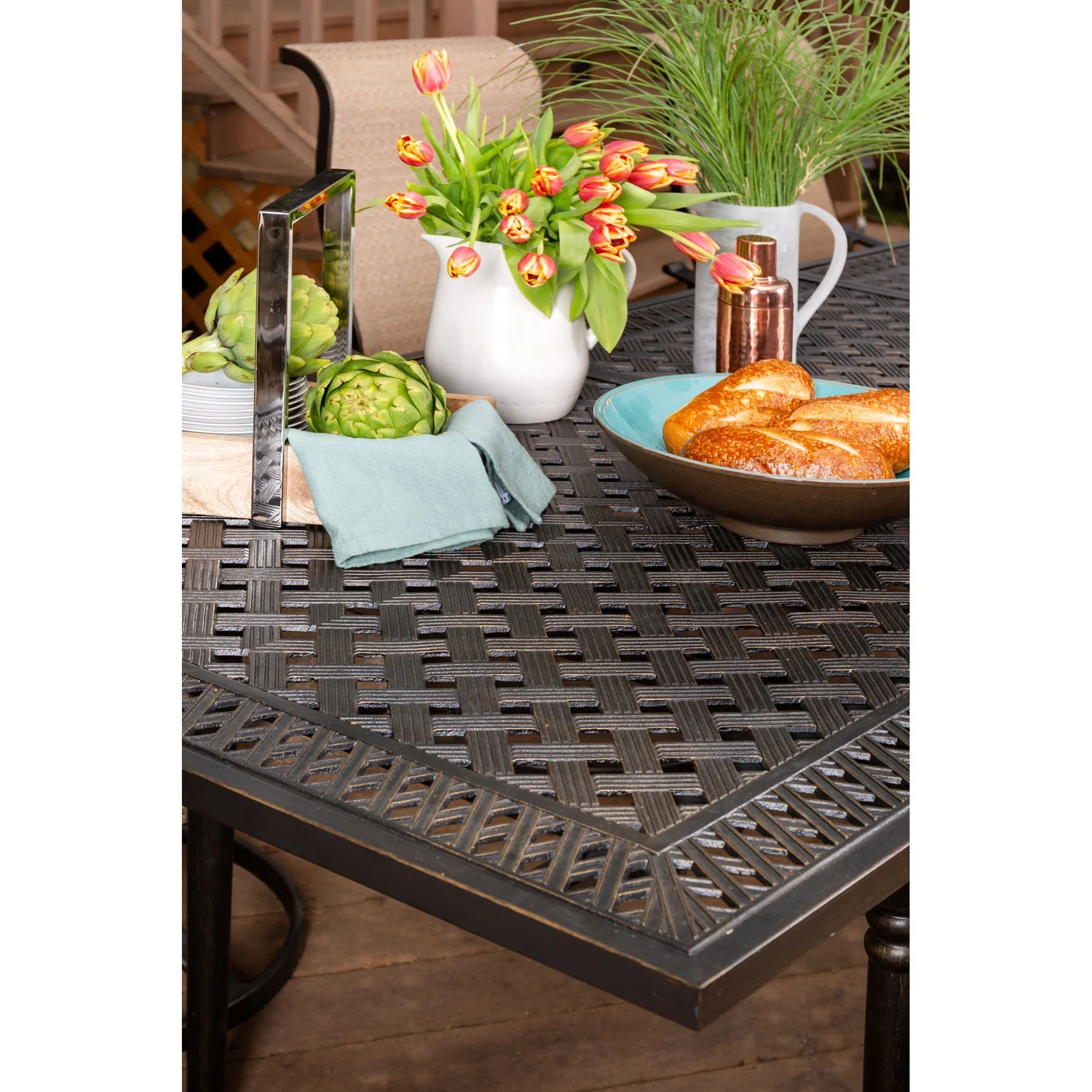 Hanover Brigantine 9-Piece Dining Set with an Expandable Cast-Top Dining Table and 8 Sling Swivel Rockers