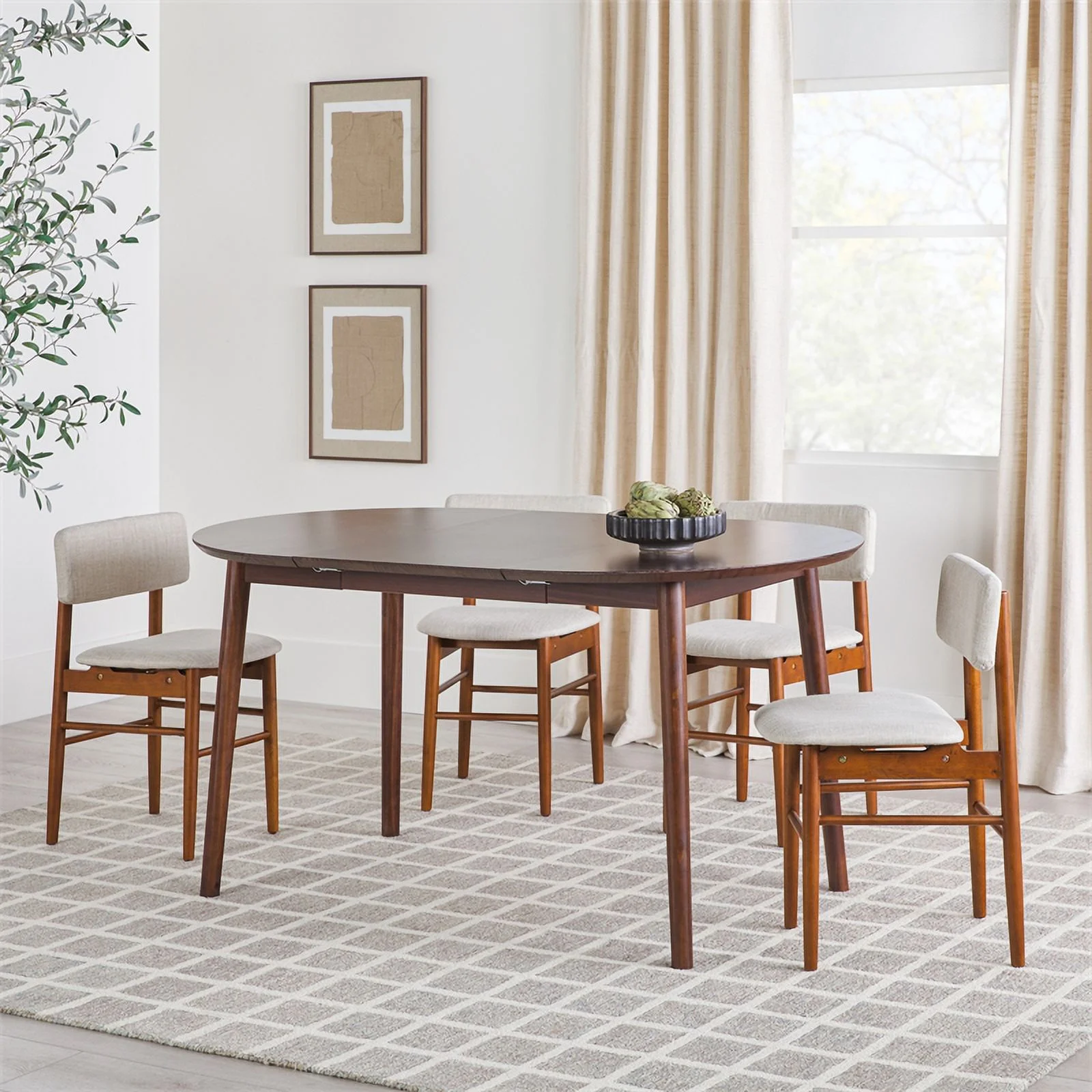 Pemberly Row Oval Solid Wood Dining Table with Removable Leaf in Walnut