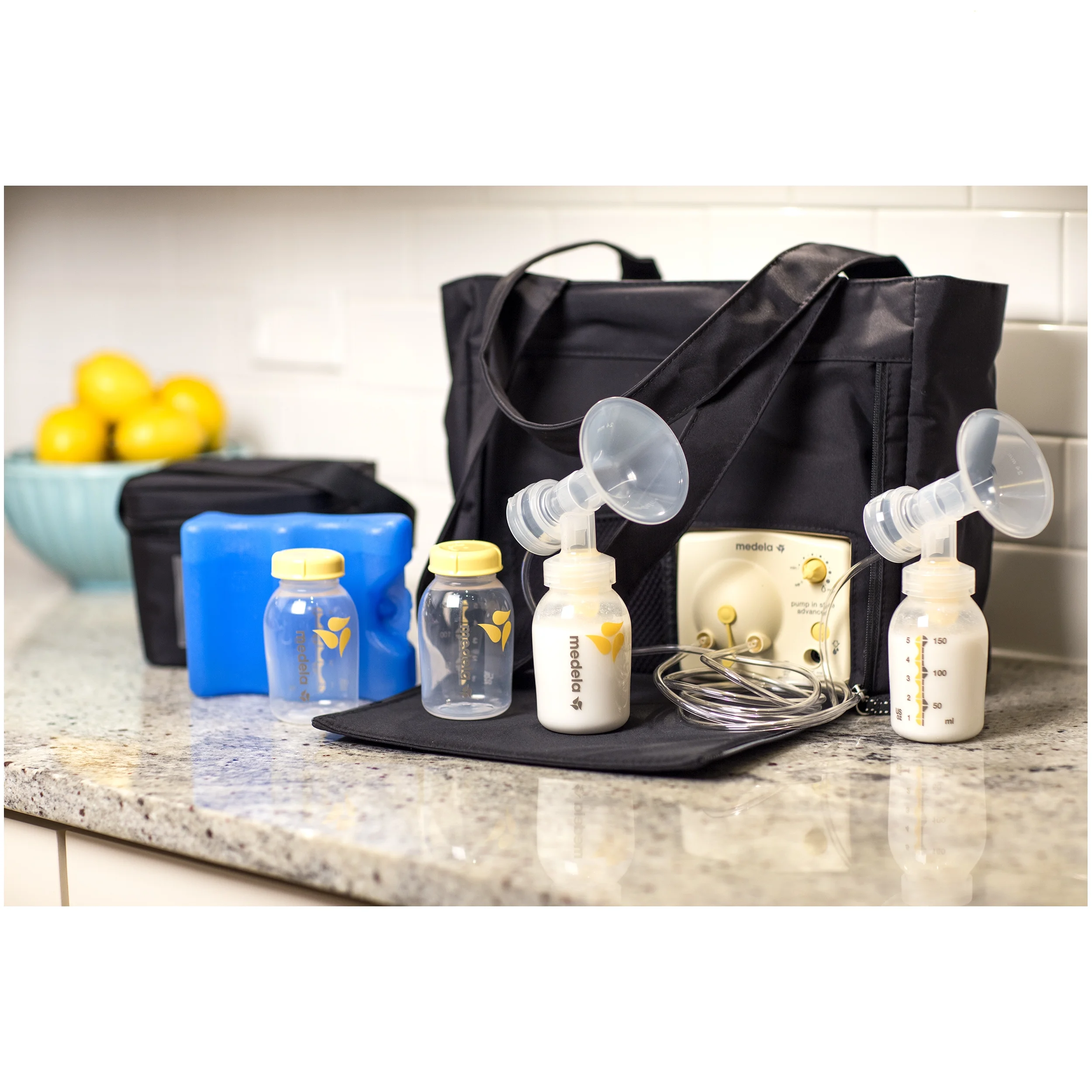 Medela Pump In Style Advanced Breast Pump with On-the-go Tote with International Adapter