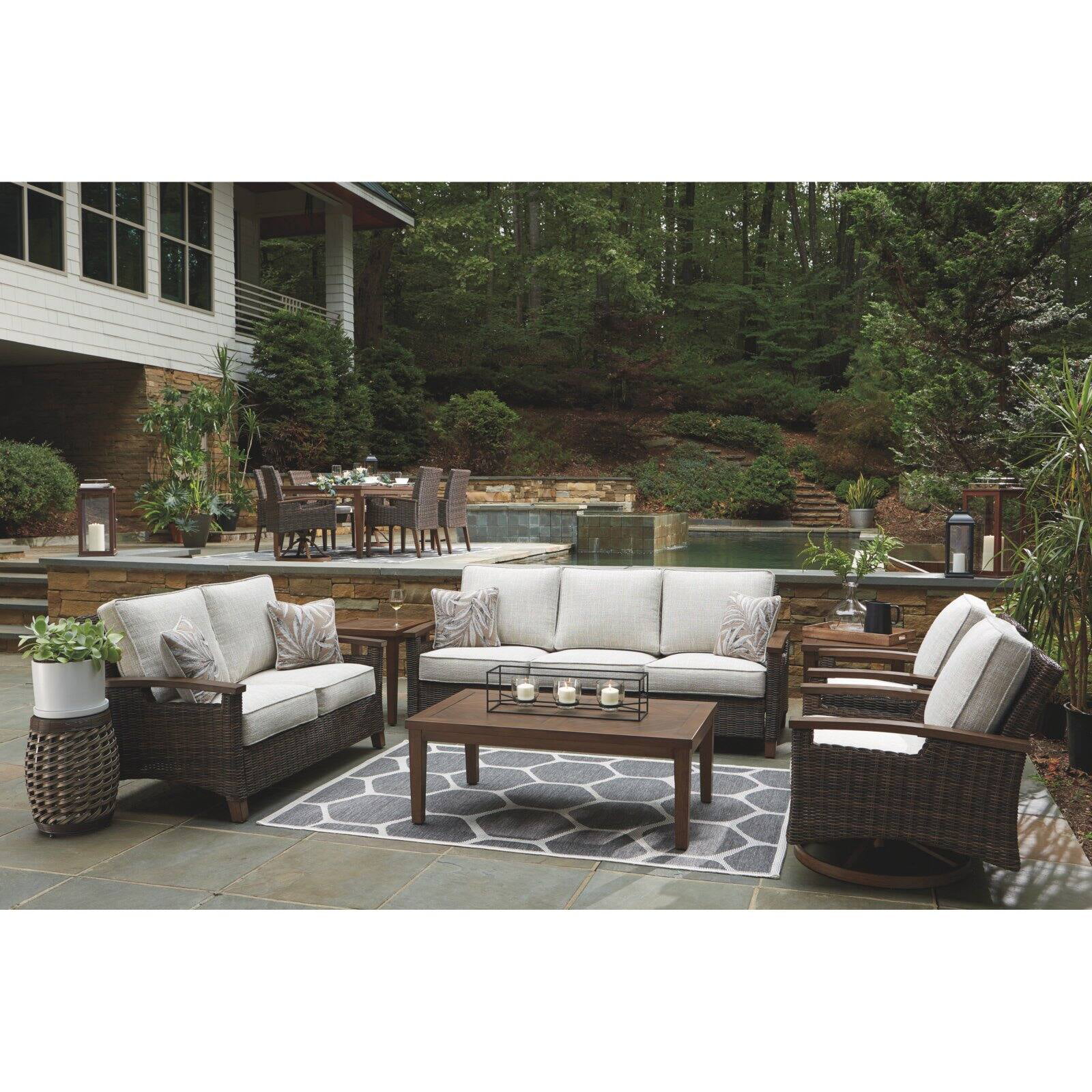Ashley Furniture Paradise Trail Patio Sofa in Medium Brown
