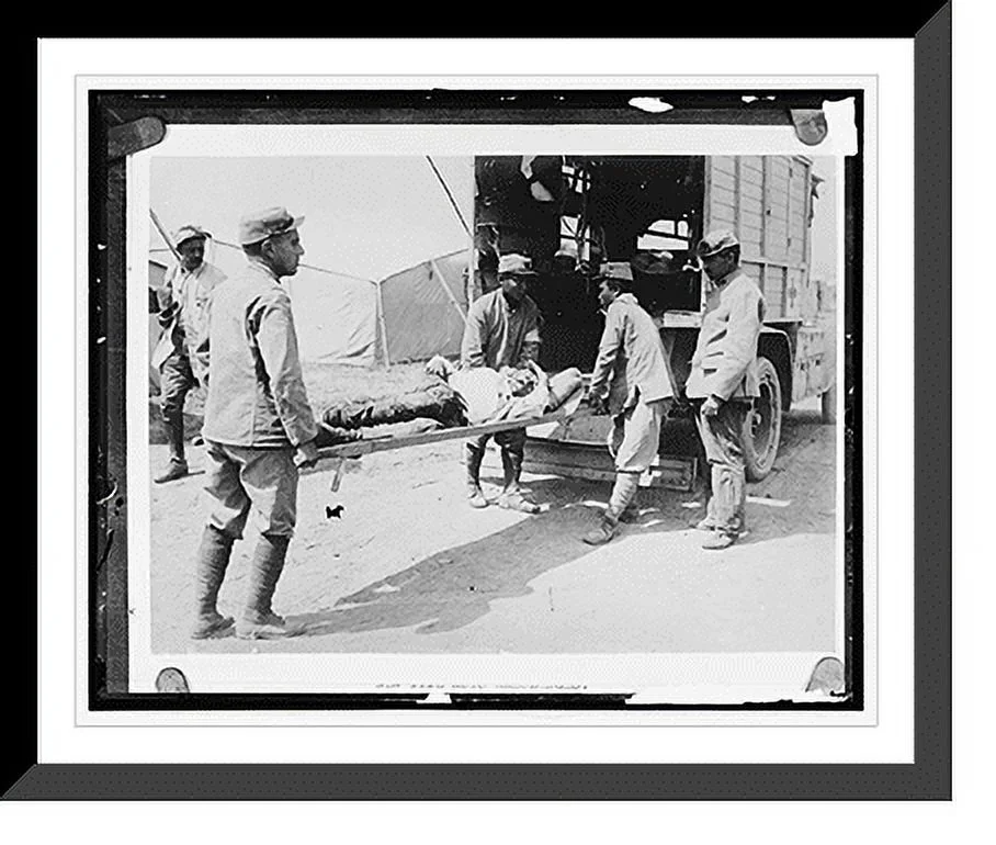 Historic Framed Print, [Wounded man on ambulance stretcher], 17-7/8